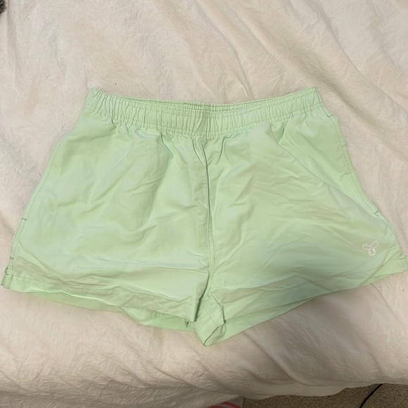 Aritzia Pants - Aritzia TNA workout shorts with pockets. Never worn!